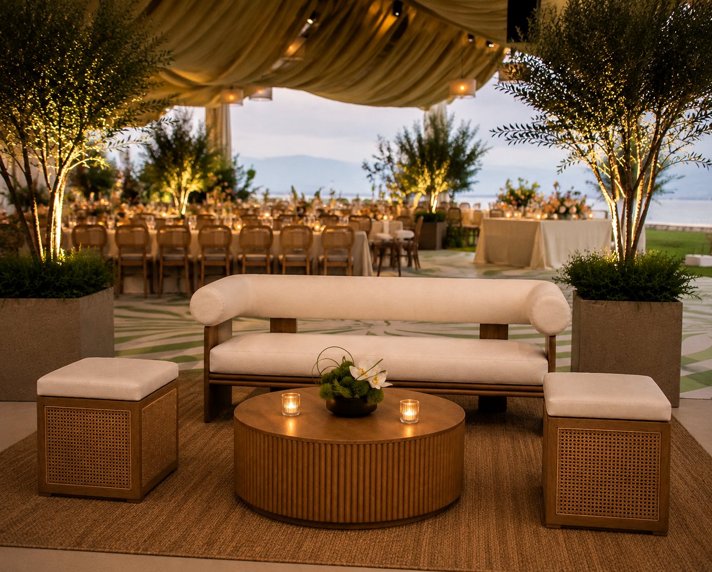 An Oak & Cane lounge at a tented lakeside wedding